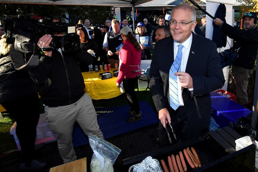 Scott Morrison manning a sausage sizzle on election day.