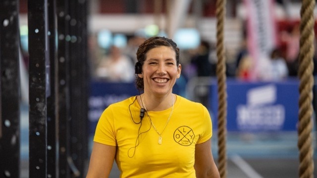 A judge smiles at the 2018 Functional Fitness World Championships