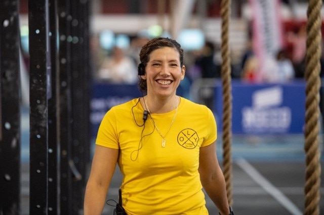 A judge smiles at the 2018 Functional Fitness World Championships
