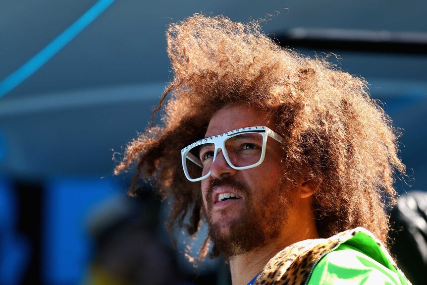 LMFAO's Stefan 'Redfoo' Gordy looks on during Andy Murray's match against Robin Haase.