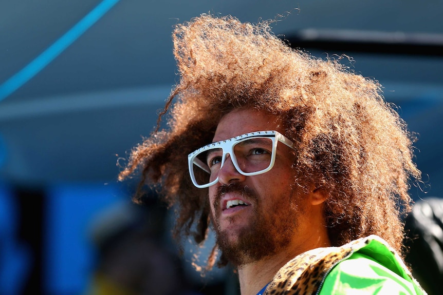LMFAO's Stefan 'Redfoo' Gordy looks on during Andy Murray's match against Robin Haase.