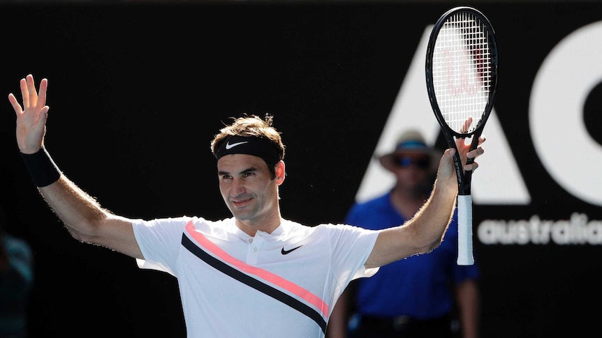 Roger Federer celebrates his win over Marton Fucsovics at the Australian Open