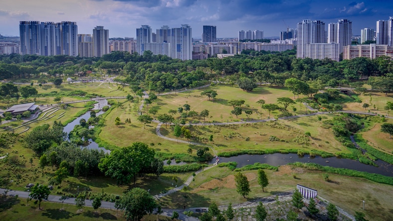 Large Singapore park with highrise buildings in the background