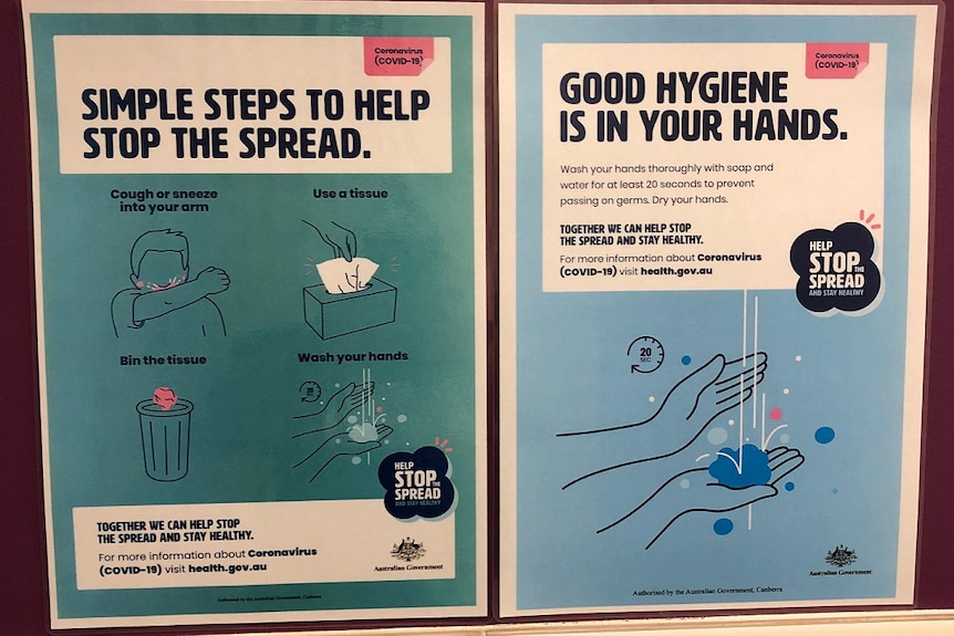 Two signs posted in a manufacturing workshop in Newcastle during the COVID-19 pandemic.