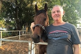 Brisbane race horse trainer Harold Hayes and mare Lead Husson