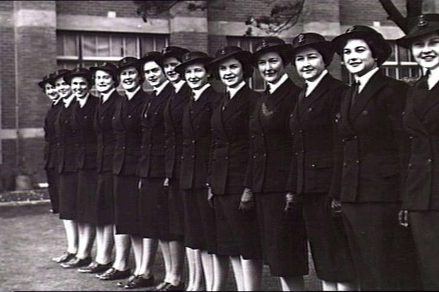 Group of women in navy uniforms and hats