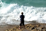 Five people were rock fishing when they were swept away.