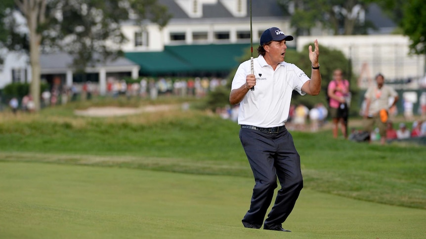 Phil Mickelson celebrates his shot at the US Open