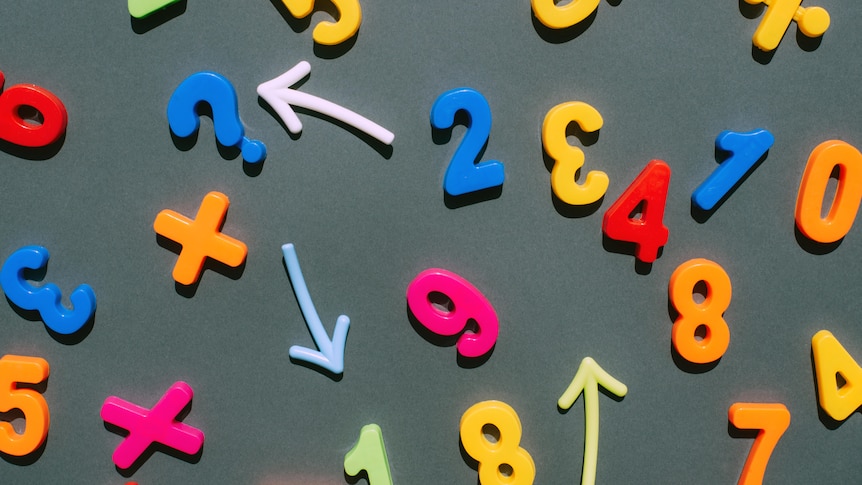 Coloured numbers sit on a dark background with arrows in a confusing pattern.  