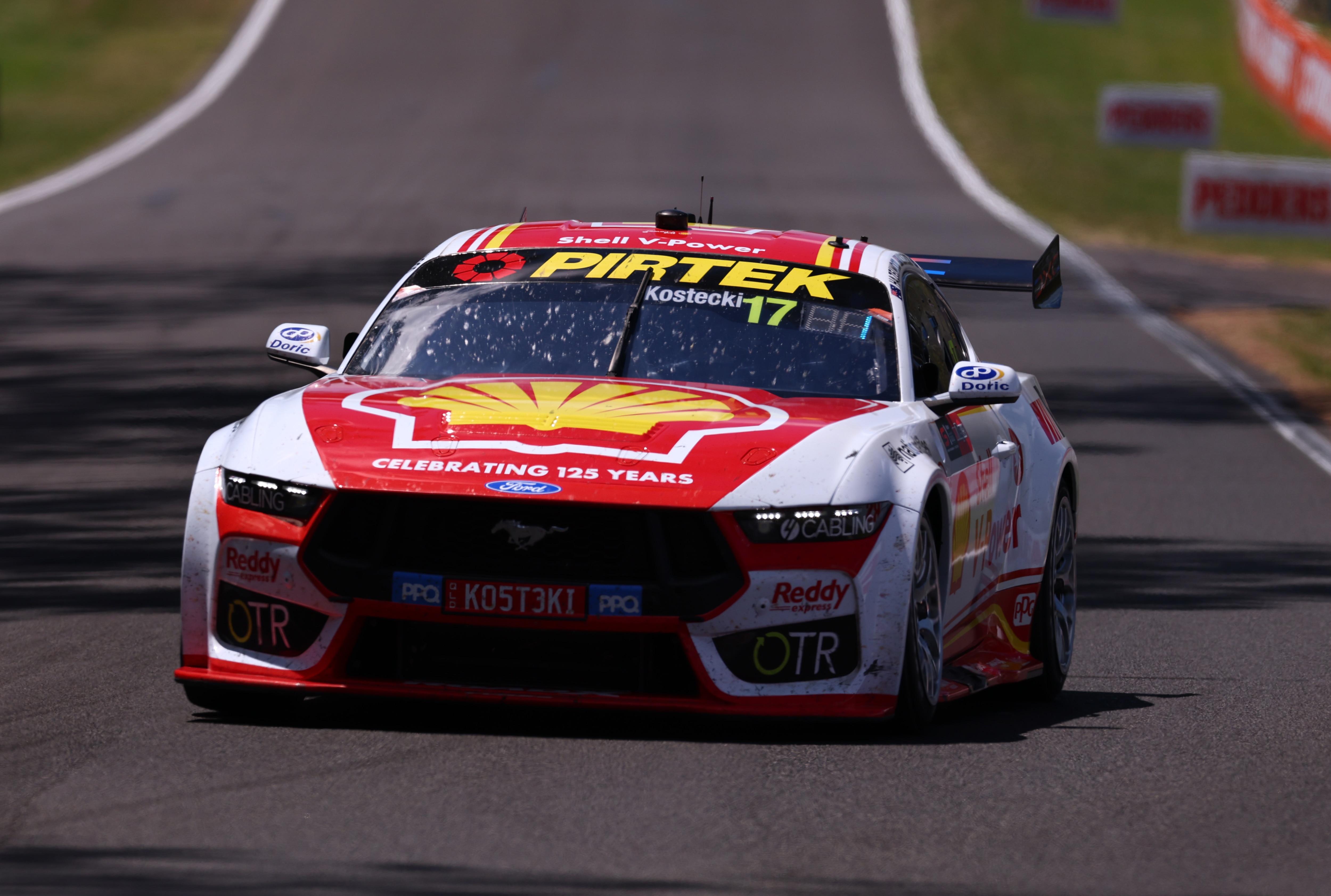 Supercar driving up Mount Panorama during the Bathurst 1000