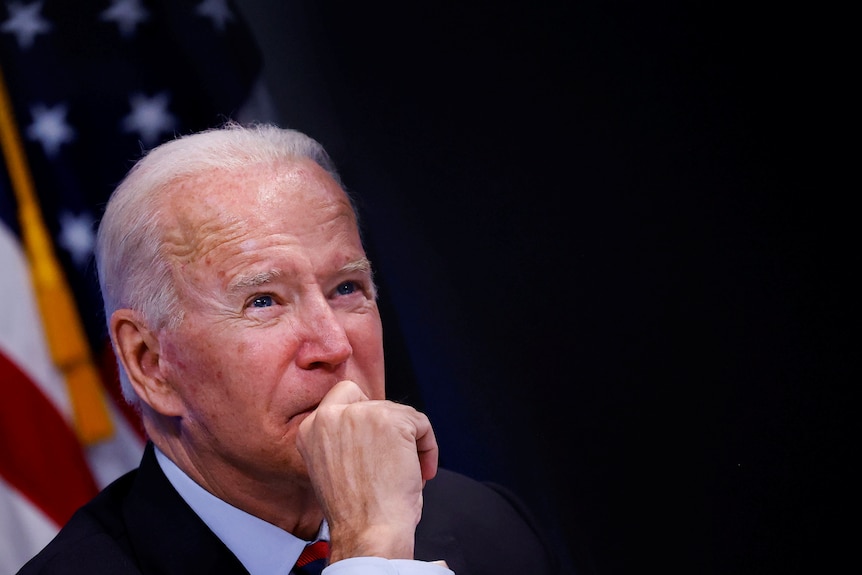 Joe Biden sits pensively at a virtual briefing on Hurricae Ida at the White House, August 30, 2021.