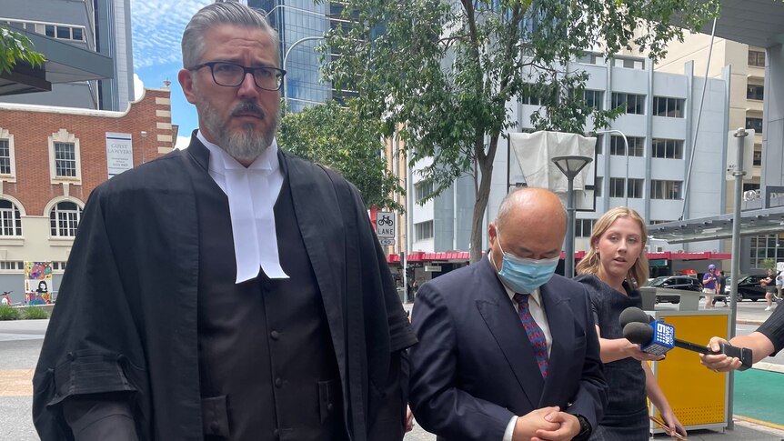 Former anaesthetist Paschalis Tai-Lun Woo outside Brisbane court after pleading guilty to assauting patients