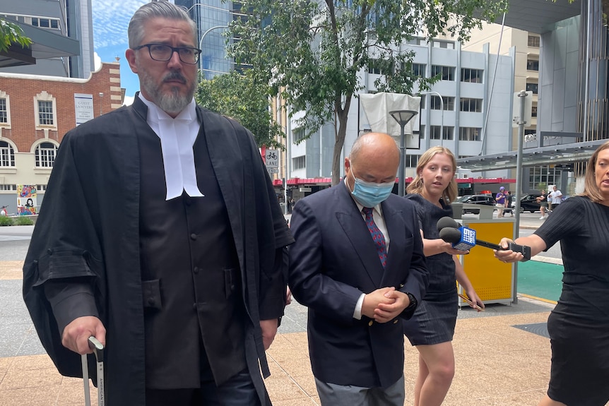 Former anaesthetist Paschalis Tai-Lun Woo outside Brisbane court after pleading guilty to assauting patients