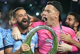 Danny Vukovic (R) celebrates Sydney FC's win alongside team-mate Alex Brosque.