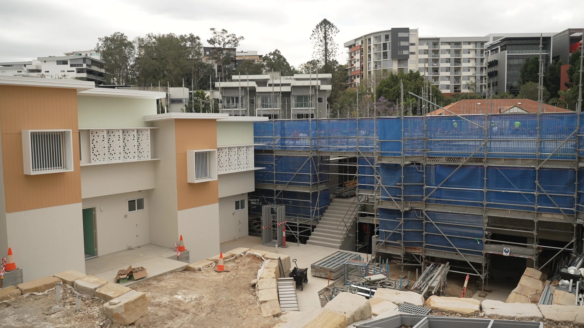 A view of a construction site showing scafolding.