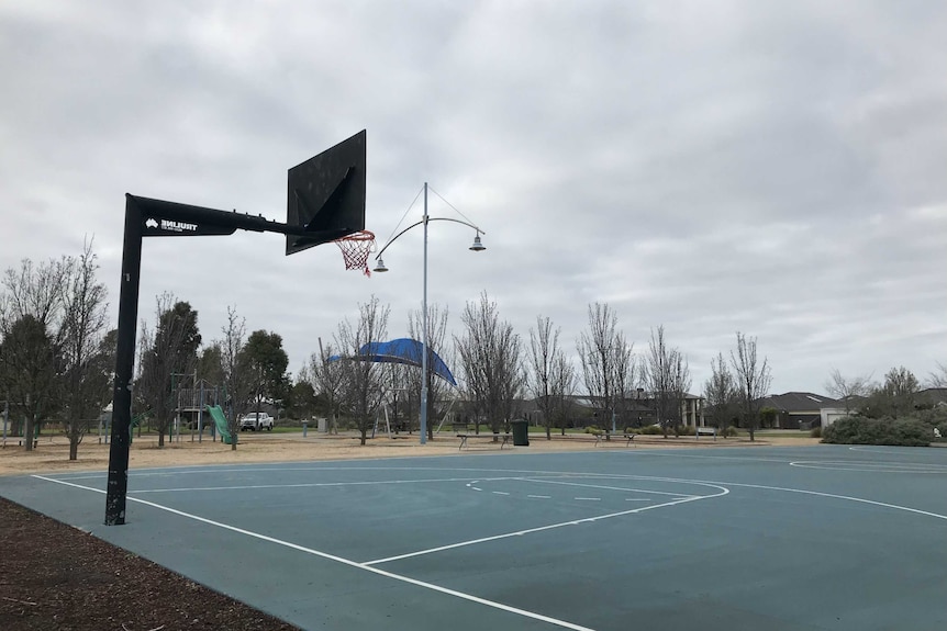 An empty basketball court at a park in Taylors Hill, in Melbourne.