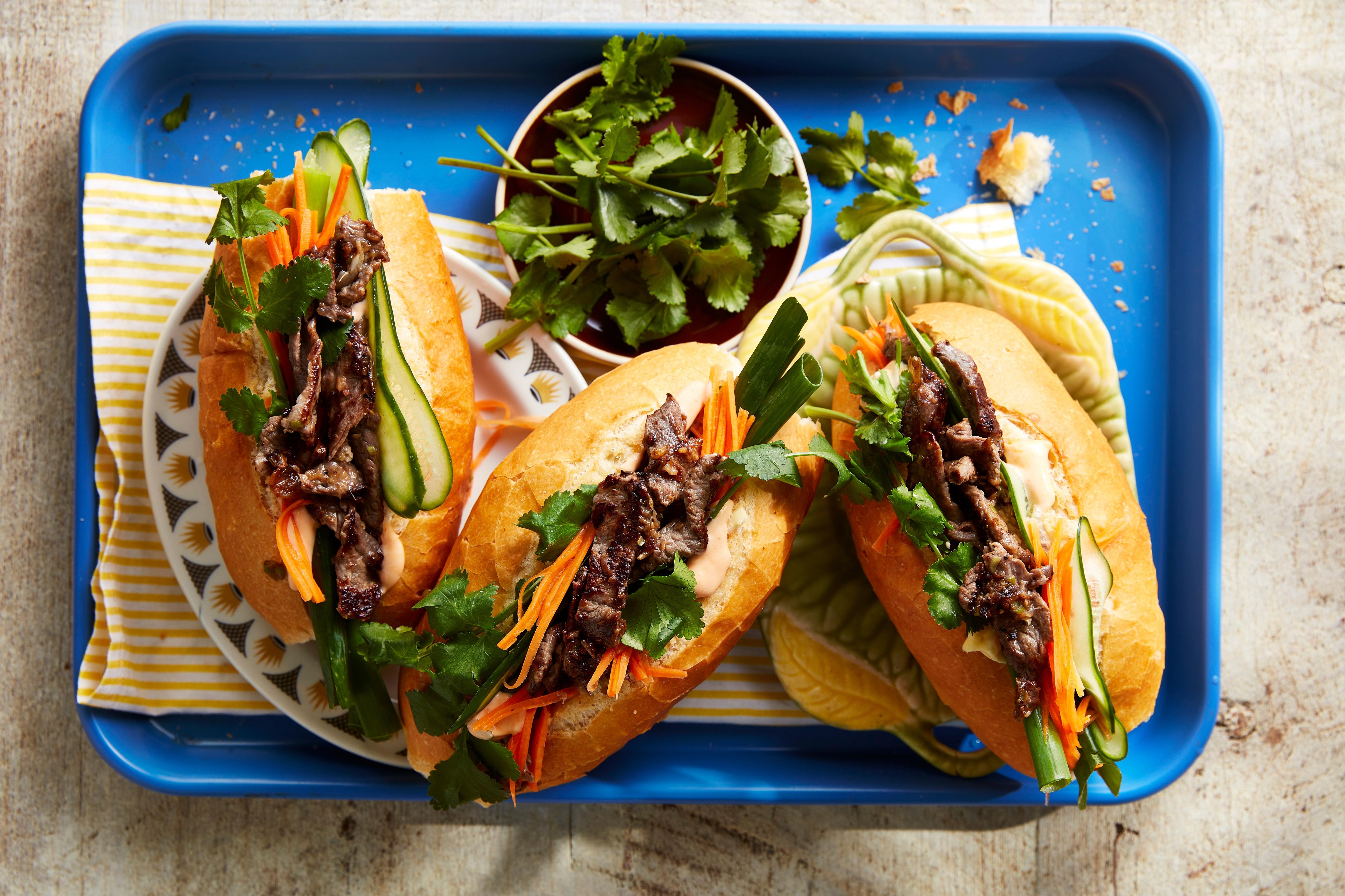 Banh mi with grilled beef, pickled carrots, cucumber and coriander ...