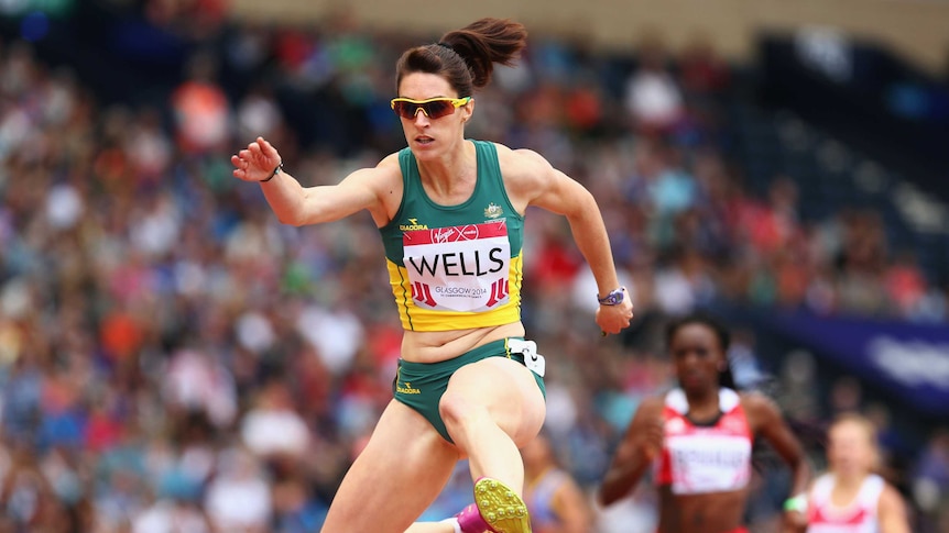 Lauren Wells competes in the 400m final at Glasgow