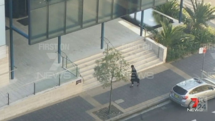 GRAPHIC CONTENT: Video shows shooter outside Parramatta police headquarters
