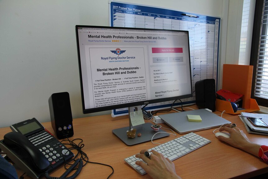 A picture of the computer screen and an advertisement for a mental health professional with the Royal Flying Doctor Service