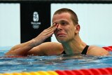 An emotional Cesar Cielo Filho wins Brazil's first swimming gold medal.