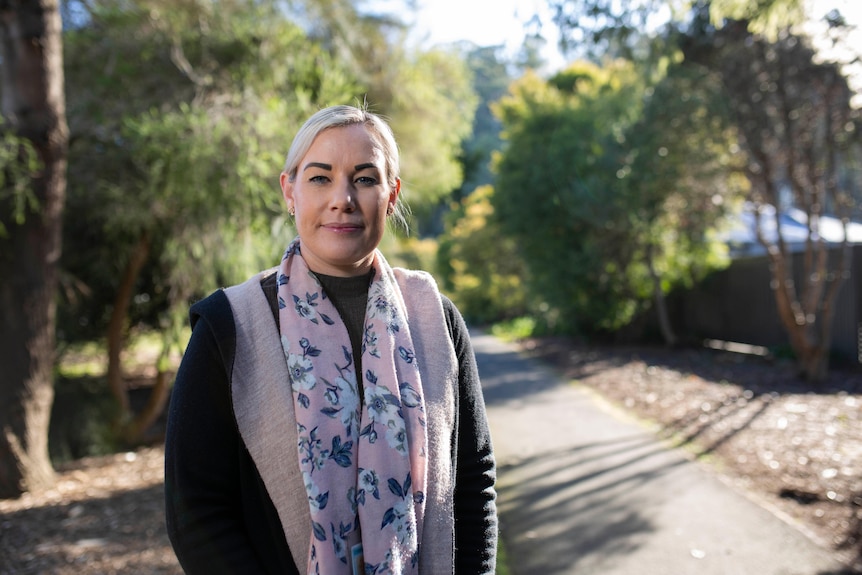 Karina, from the Fit for Work Program stands in a park in Latrobe.