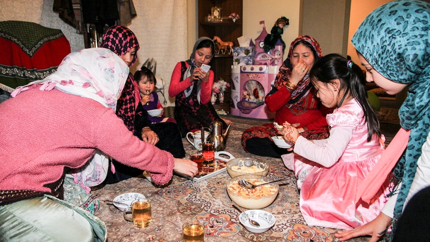 The final meal of Ramadan, or iftar, is shared by three Bendigo Afghan families.