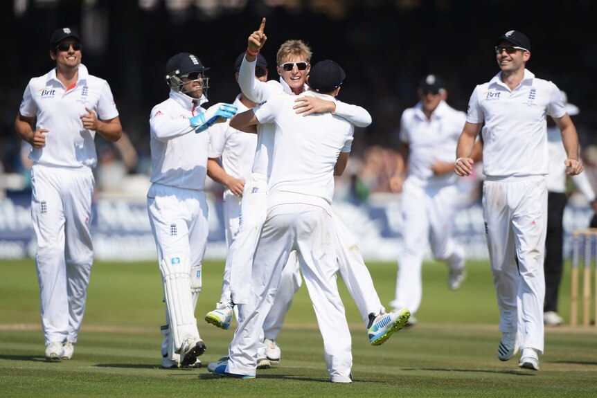 Danger man ... Joe Root and team-mates celebrates the wicket of Usman Khawaja