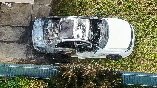 An overhead shot of a scorched wreck of a car in Mount Gambier.
