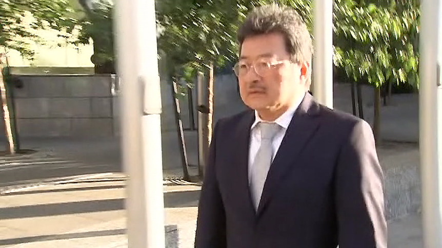 Video still of TPG founder David Teoh walking out of the Federal Court in Melbourne in September 2019.