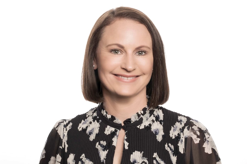 A headshot of Megan Osborne against a white background.