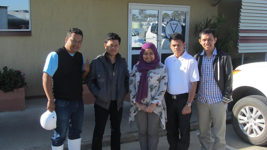 Teddy Trenaydi, Noorus Hudaya, Fitriani Hidayah, Muhamed Yaman and Danang Setiawan outside Nolan Meats abattoir in Gympie.