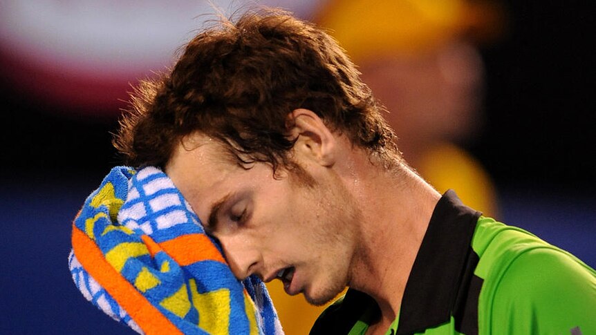 Murray 's serve was broken twice in succession as Djokovic raced to a 5-0 lead in the second set.