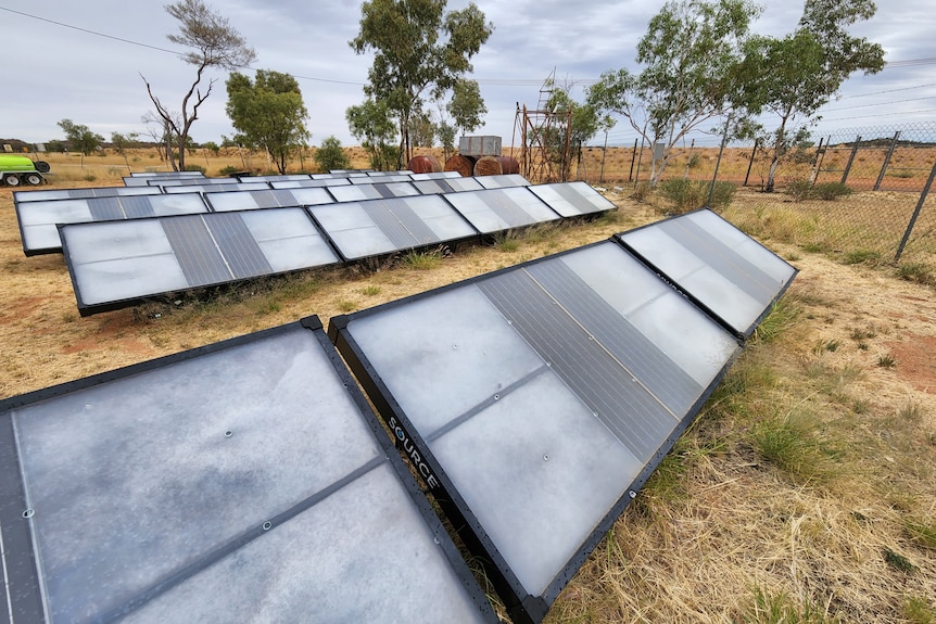hydropanels in rows on the ground, facing up towards the sun