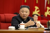 North Korean leader Kim Jong Un pictured speaking during the third-day sitting of the 3rd Plenary Meeting.