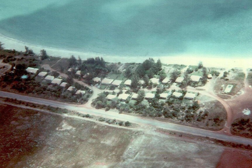 An old aerial photo of Wallaby Beach.
