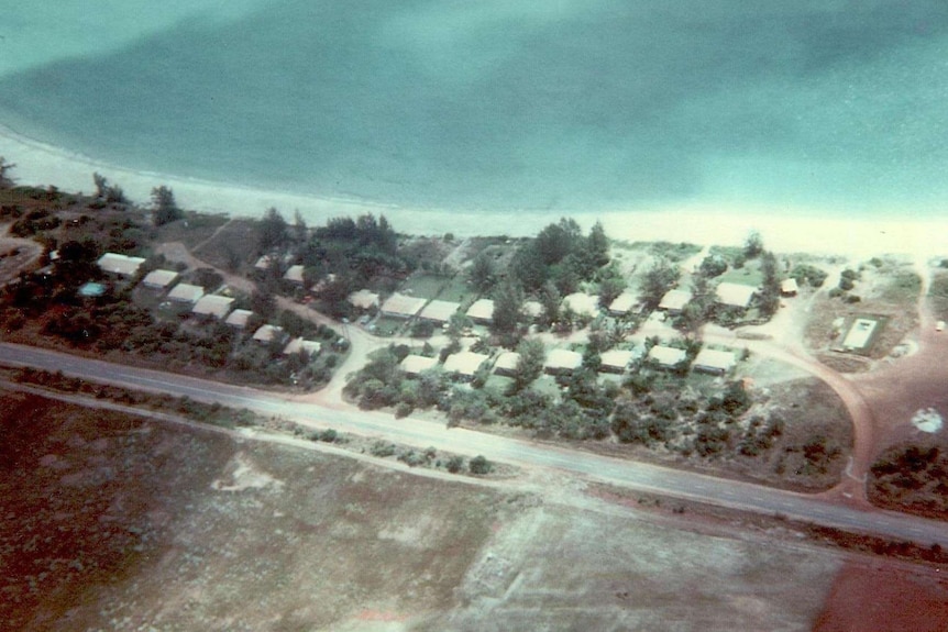 An old aerial photo of Wallaby Beach.