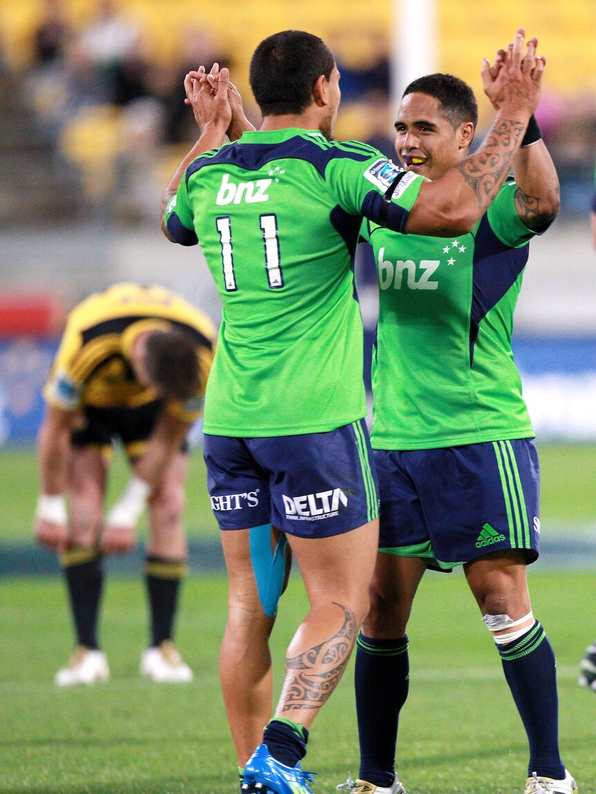 Undefeated... Highlanders duo Aaron Smith (R) and Hosea Gear celebrate another win.