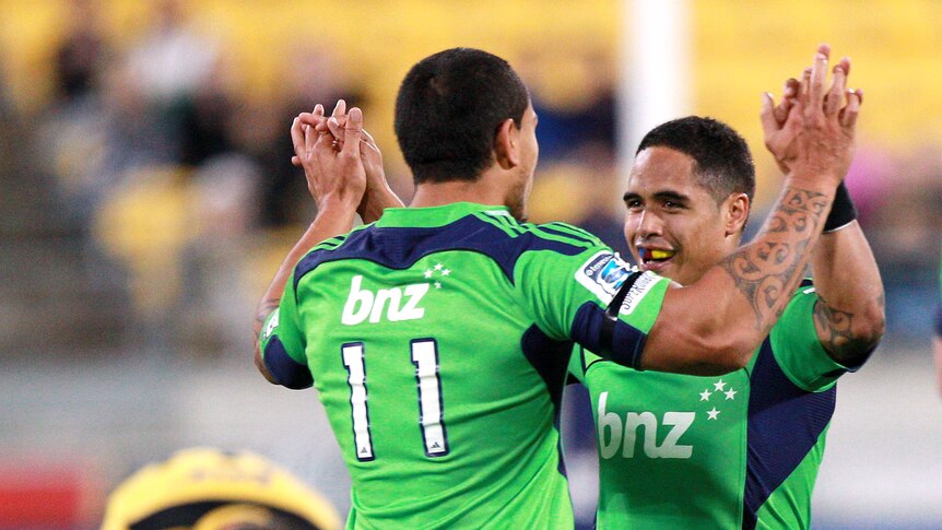 Undefeated... Highlanders duo Aaron Smith (R) and Hosea Gear celebrate another win.