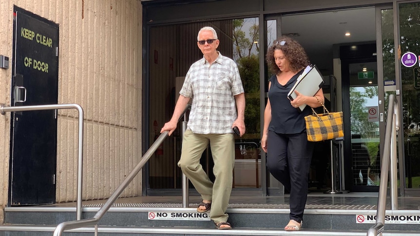 Jeffrey Hulcombe walking down the steps of the Alice Springs Local Court.