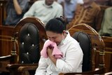 A woman cries in Indonesian court over her sentencing