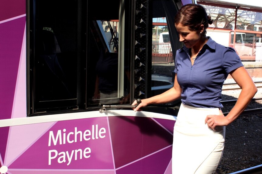 Michelle Payne standing with the Vlocity train named in her honour in Ballarat, Victoria on December 22, 2015.