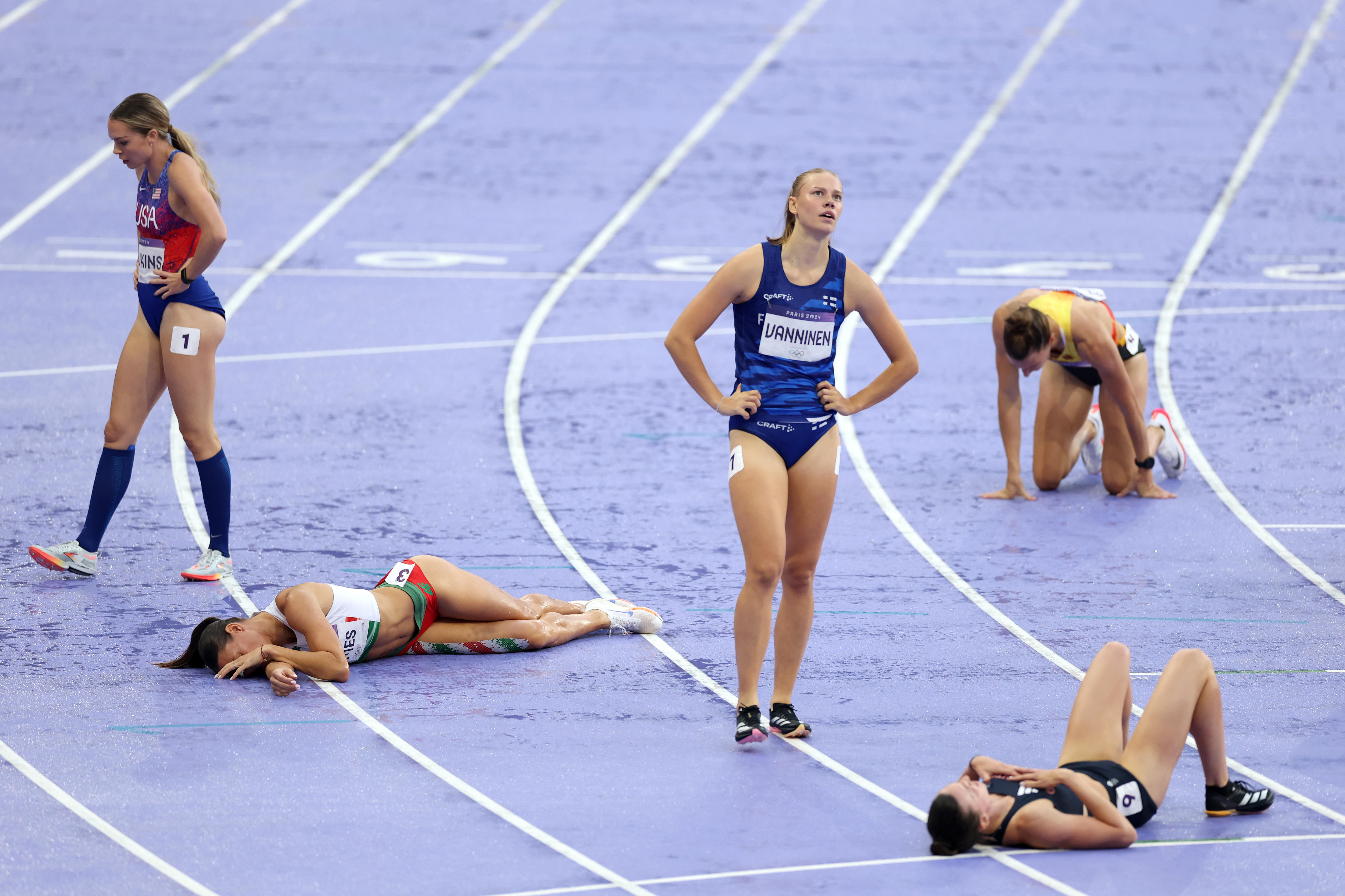 Exhausted athletes after the Olympic heptathlon