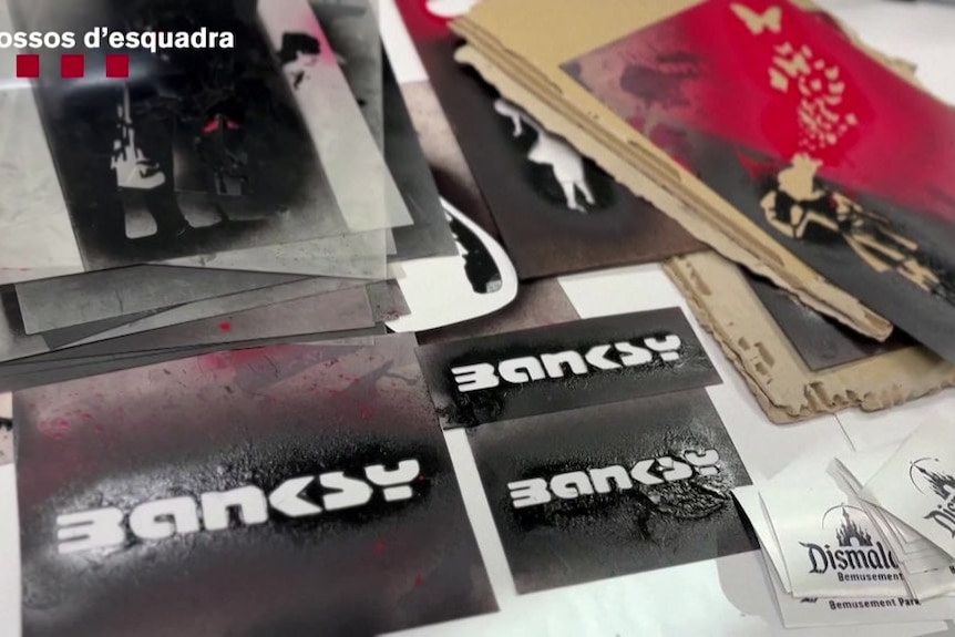 Screengrab from police vision shows immitation Banksy artworks.