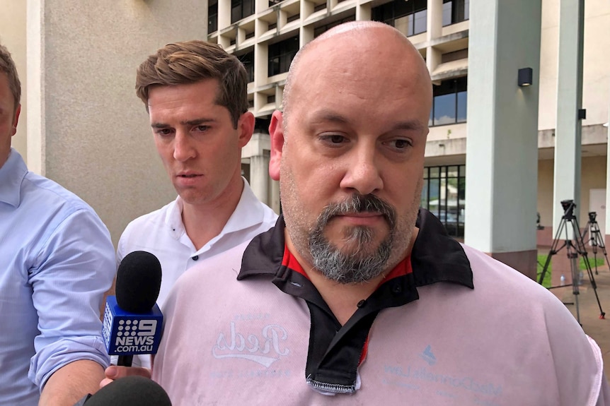 Michael Glen Lewis leaves court in Cairns after being granted bail on 25 February, 2020.