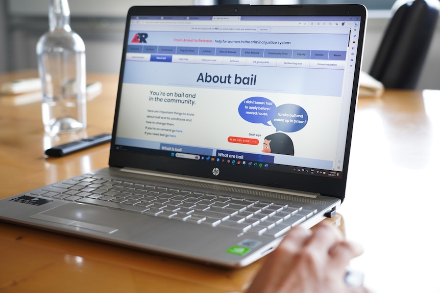 A computer with a program 'About bail' in the foreground
