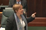 Premier Lara Giddings makes a point during a sitting of the Tasmanian Parliament.