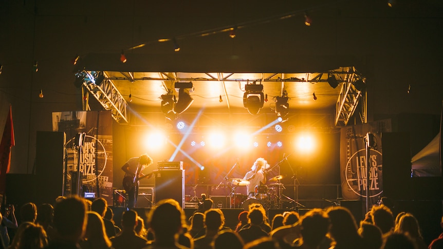 Band playing on stage.