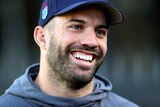 NSW Blues captain James Tedesco smiles during a press conference before a State of Origin game.