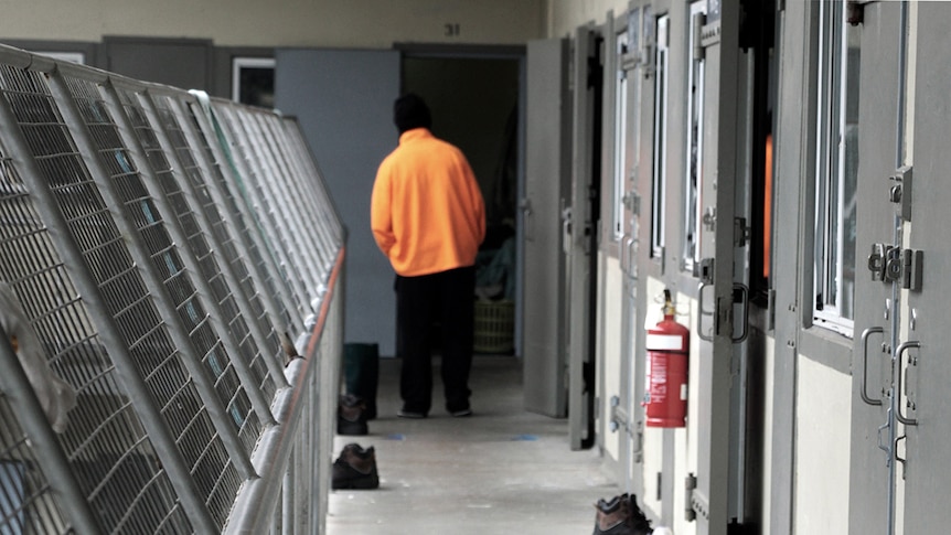 Risdon prison interior walkway with unidentified inmate.